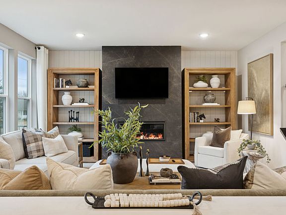 Cozy and inviting, this gathering room is perfect for relaxing or entertaining guests.