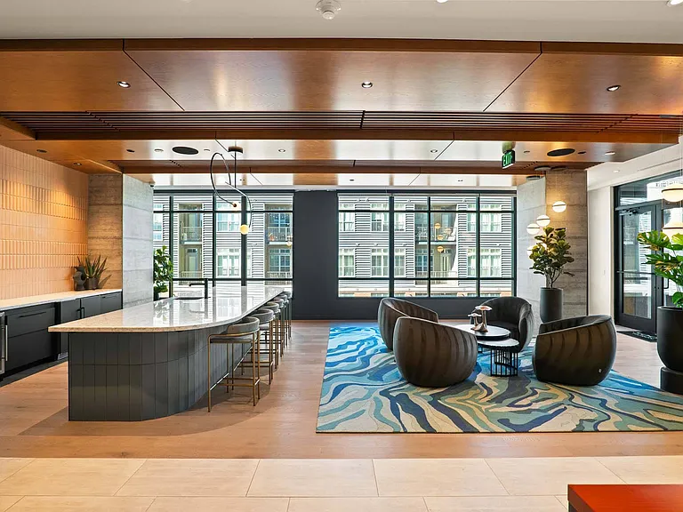Enjoy the open feel of a modern lounge kitchen, complete with a stylish bar for casual gatherings.