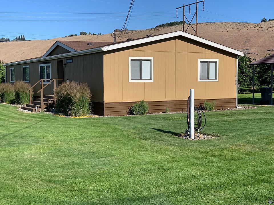 Exterior front and west end.