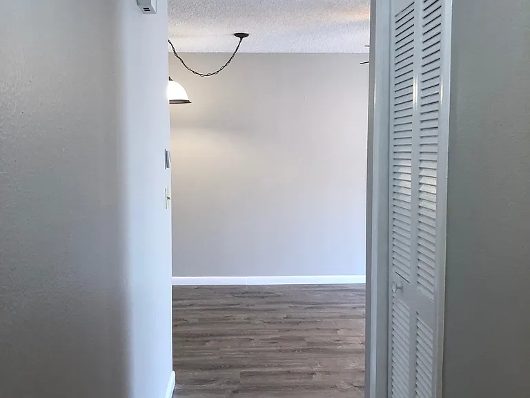 Hallway from bedrooms to living room