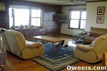 The living room and kitchen are connected and open.