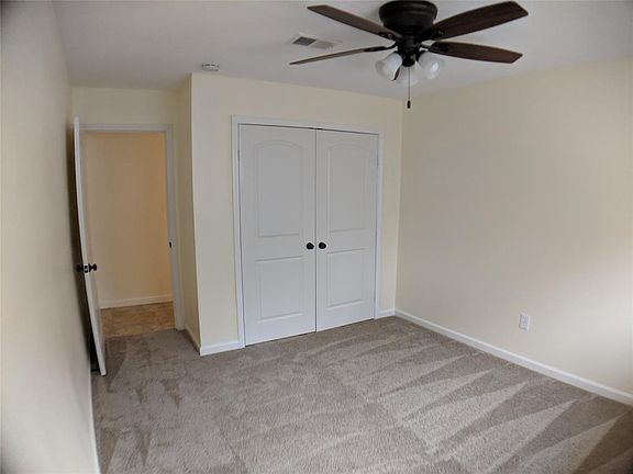 Bedroom located on the first floor with plenty of natural light and double doors closet. Fresh paint and new carpet and fixtures.