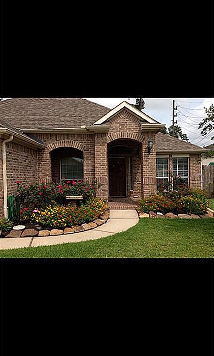 Here is a picture of landscaping from last Spring, to give you an idea of what it will look like.