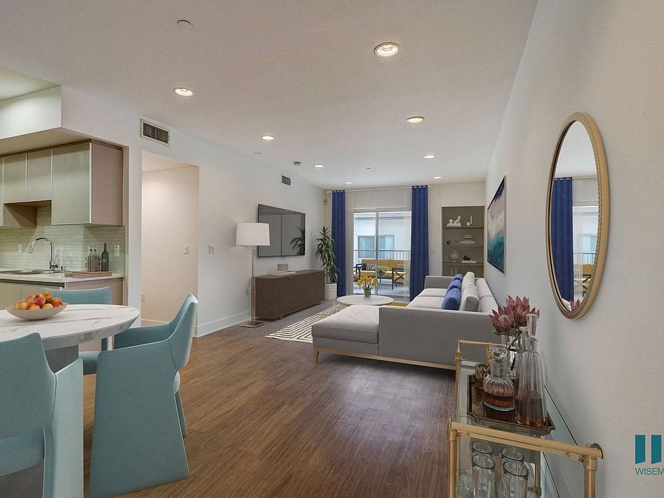 Kitchen, Dining, and Living Room with Patio