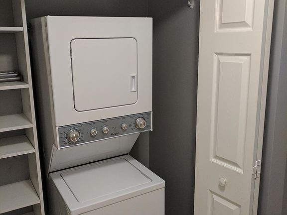 In Unit Washer and Dryer, storage shelving / closet.