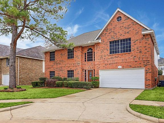 This two story 4 bedroom 3 1/2 bath 2 car garage has inviting curb appeal.