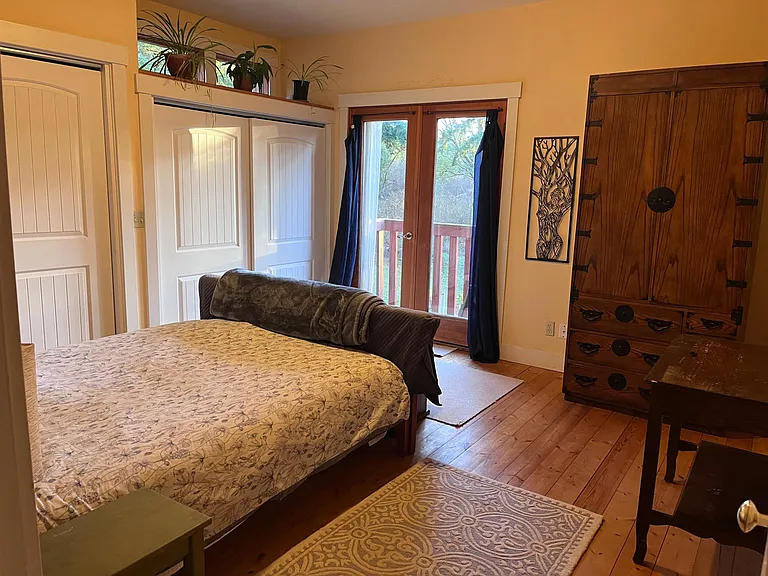 Master bedroom, staged with furniture