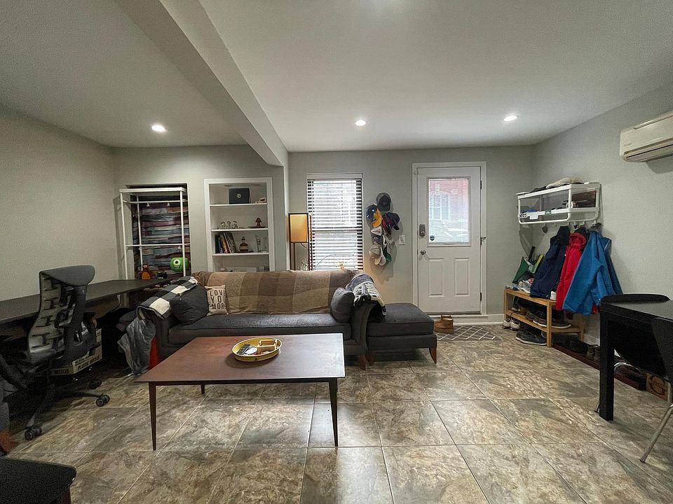 Huge living room with space for both dining table and office set up.