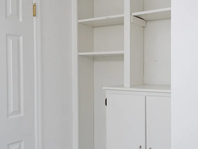 The master bathroom also features plenty of storage space.