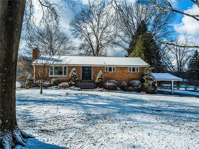 Welcome to 113 Yorkshire Drive. Flat 2-acre lot on cul-de-sac.