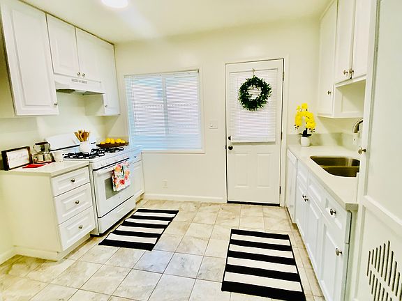 Cozy kitchen with a back door