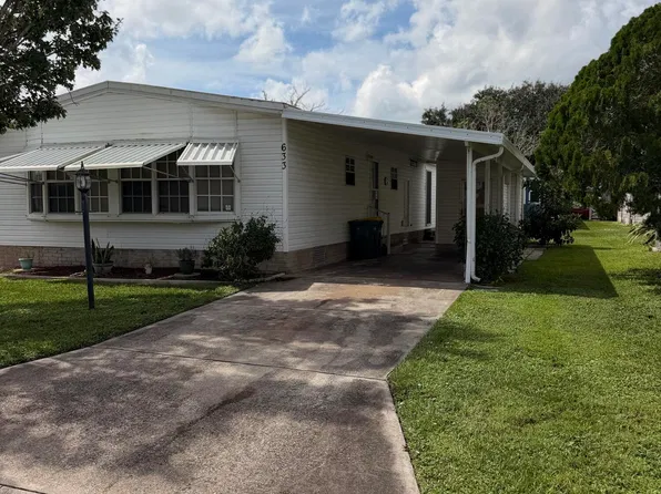 633 Amaryllis Dr, Barefoot Bay, FL 32976
