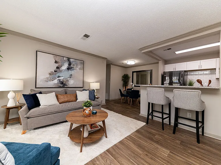 Spacious living room with hardwood-style flooring