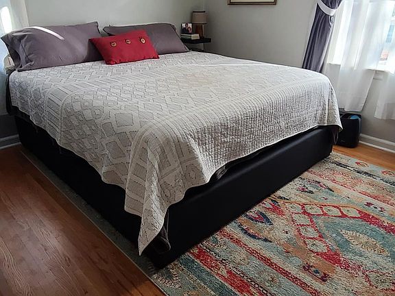 Master has king bed with adjustable base.