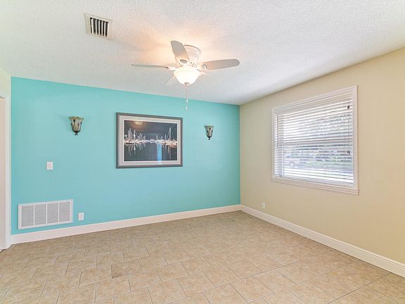 Dining w/electric sconces. 