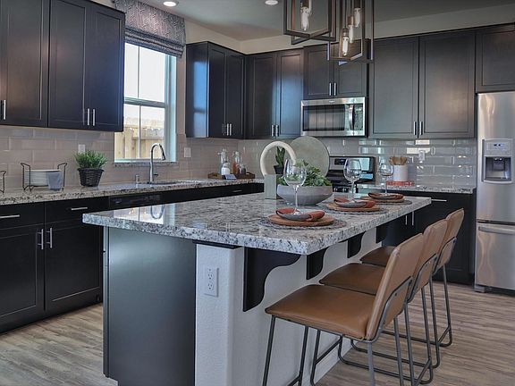 Photos with staging effect of the model home, this is an unfurnished home
