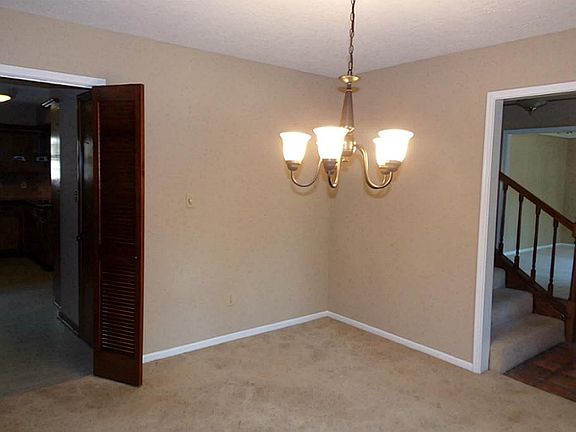 Formal dining room for your entertaining pleasure.  Fresh paint and replaced carpet.
