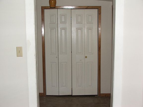 Front door area with closet