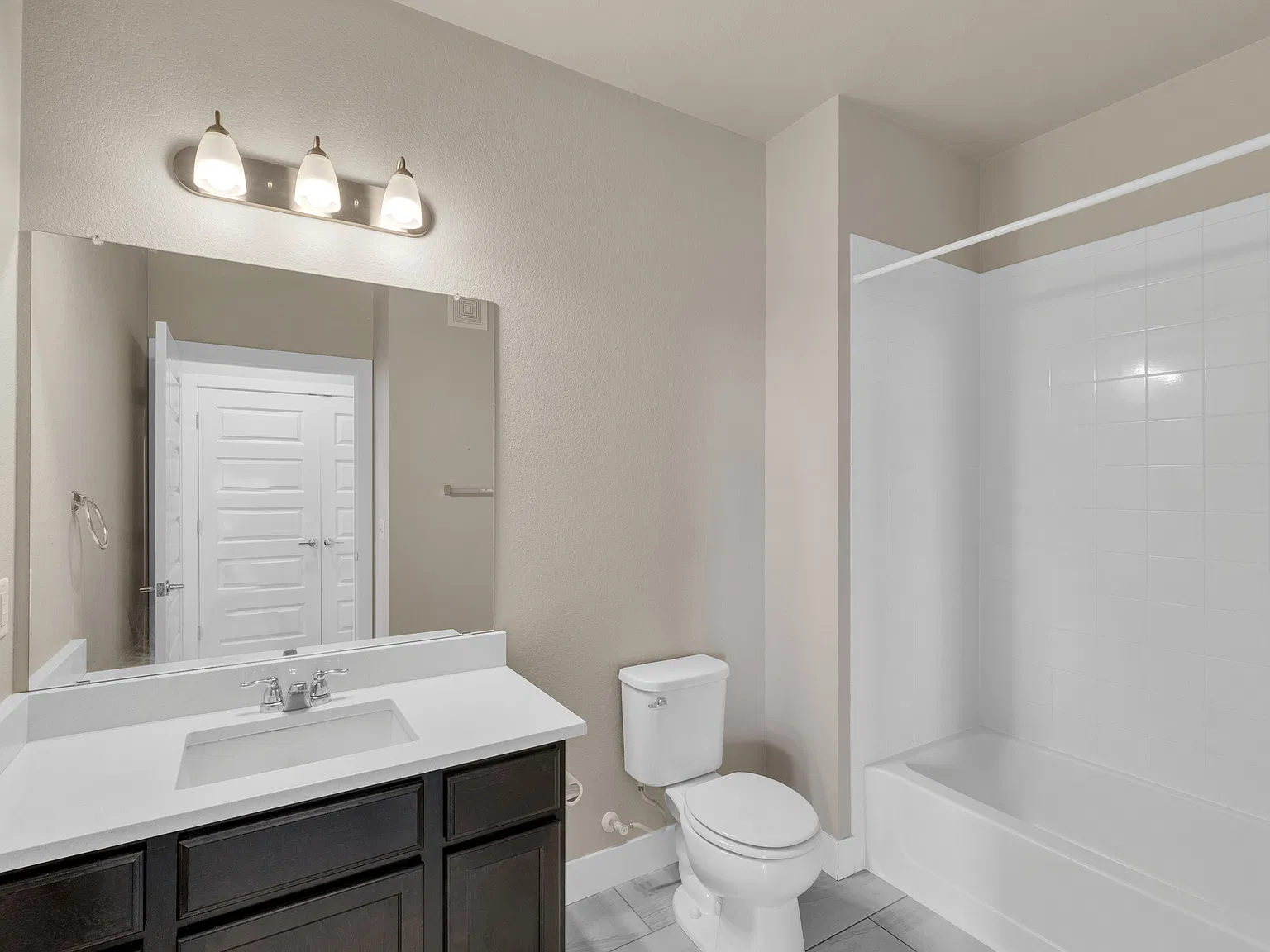 15354 W 64th Ln — Photo 3