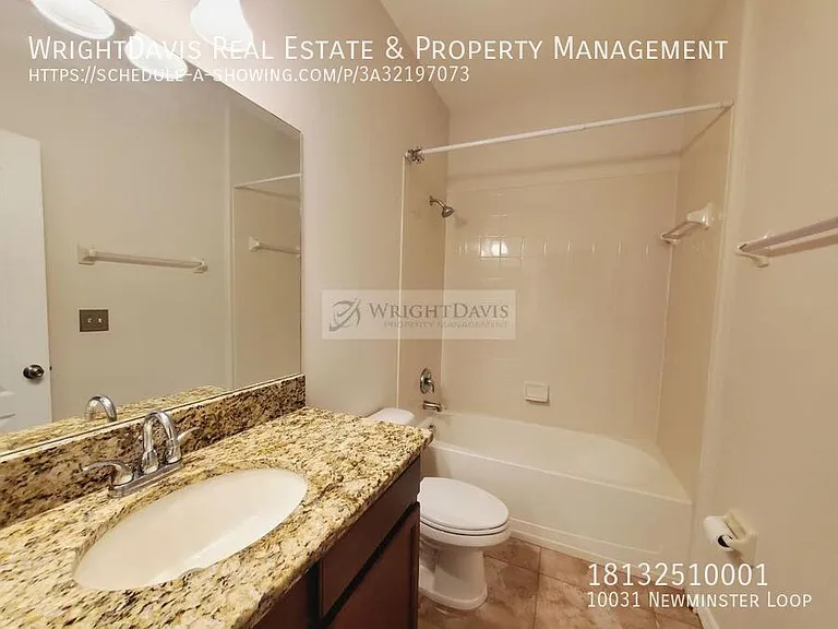 10031 Newminster Loop — Photo 32