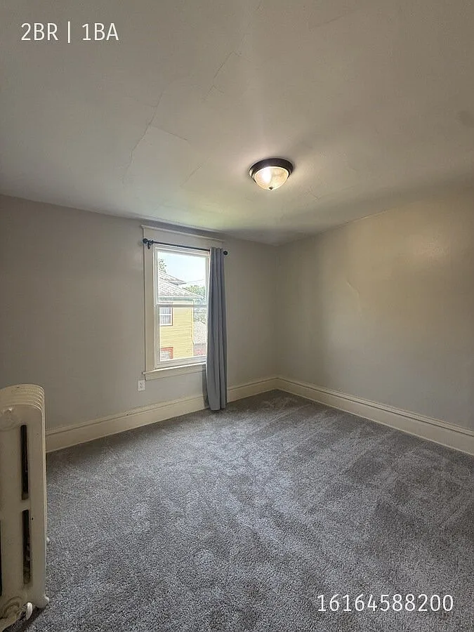 Beautiful 2BR/1BA Upper Apartment at 205 Valley NW #4, Grand Rapids, MI 49504 — Photo 3
