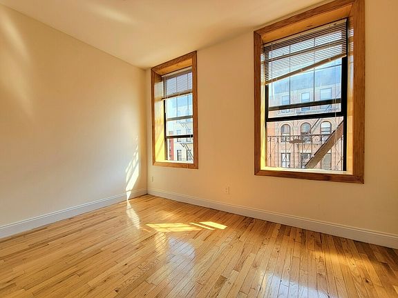 4th image of 111 E 7th St APT 51