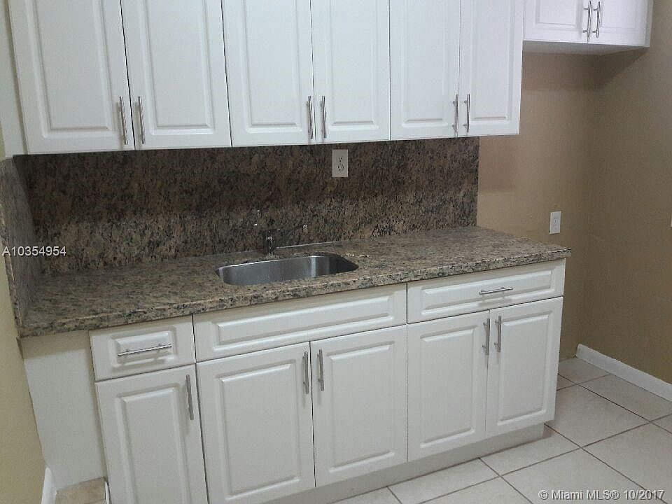 1st image of 211 NW 43rd Ave
