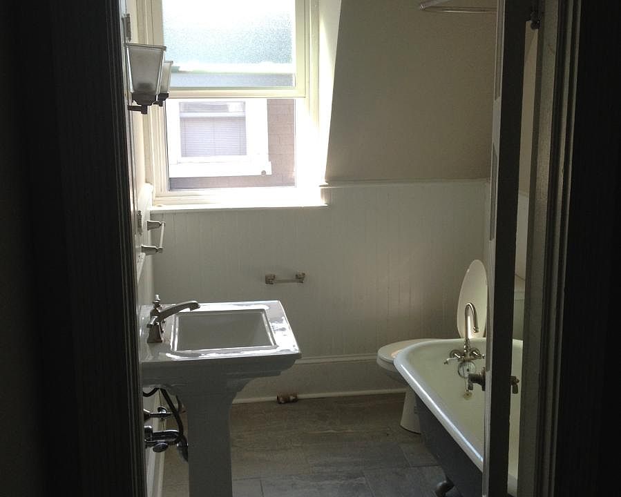 Bathroom with clawfoot tub Includes shower)