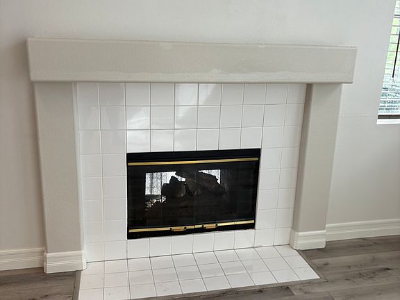 Dual fireplace living room area and family room.