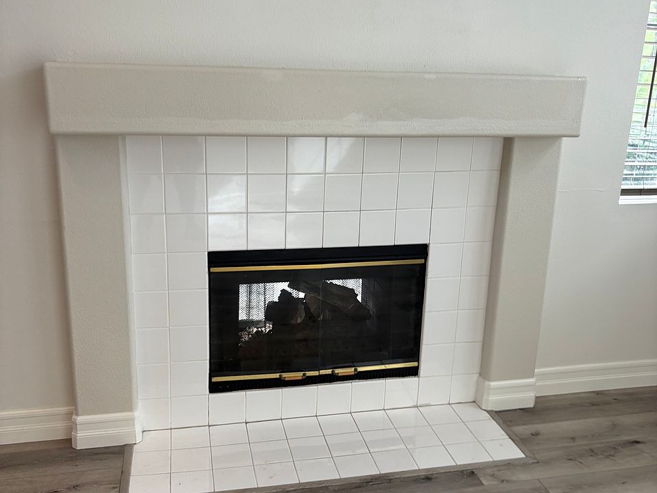 Dual fireplace living room area and family room.