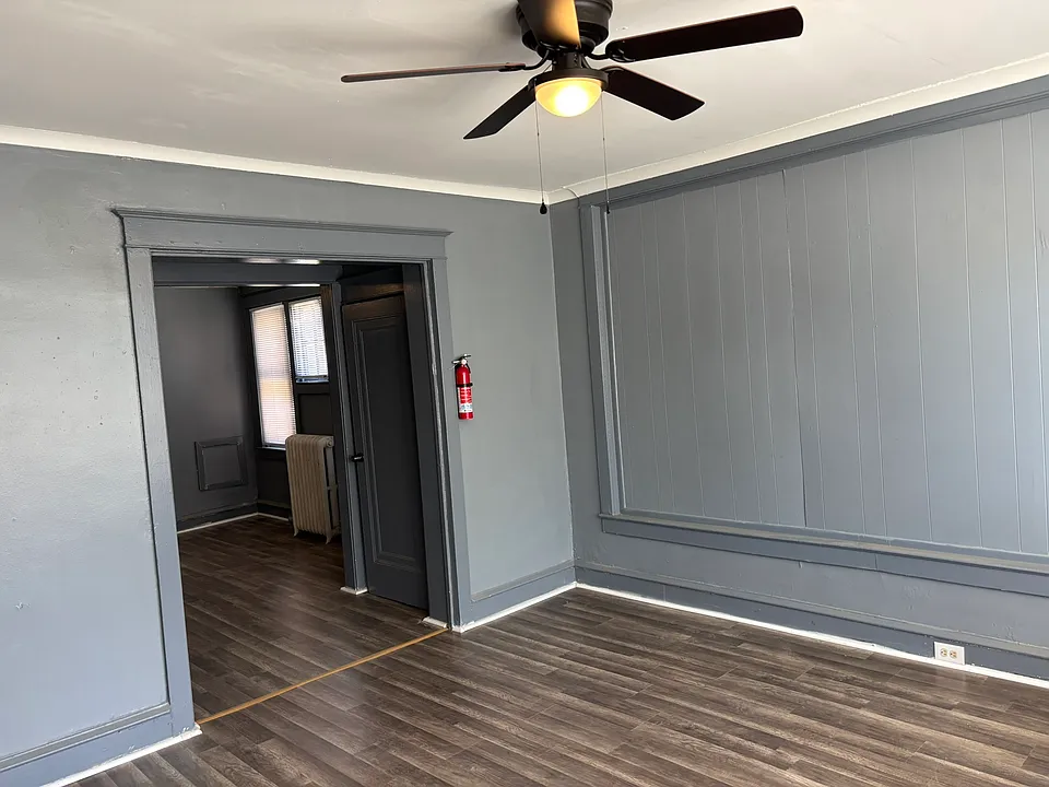 Living room viewing bedroom entrance.