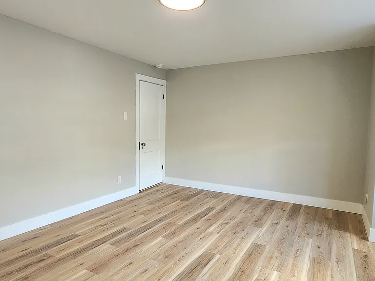 Main bedroom located at front of home. Angle 2.