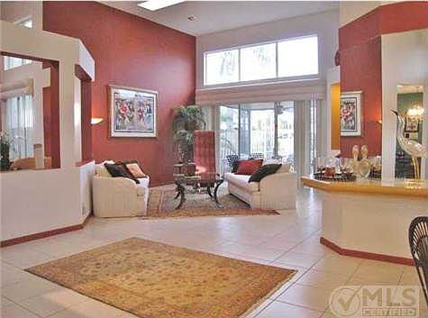 GREAT ROOM, HIGH CEILINGS, SLIDERS TO SCREENED POOL