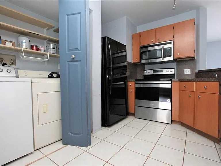 3413 NW 44th St #107 — Photo 9