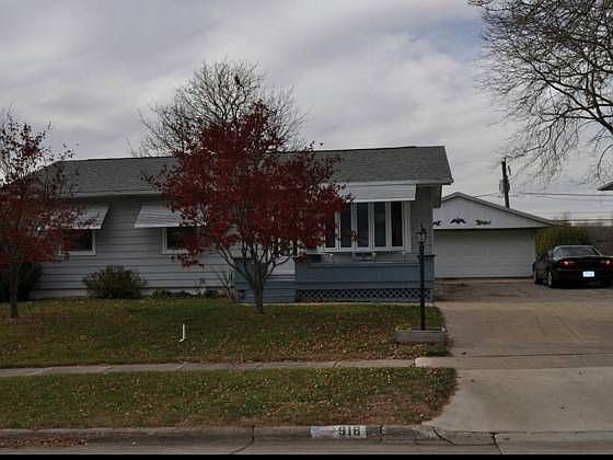 Warm and inviting home with 2 car garage and double-wide driveway.
