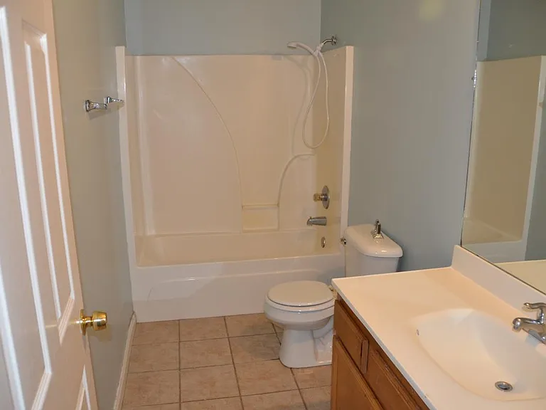 one of two full bathrooms