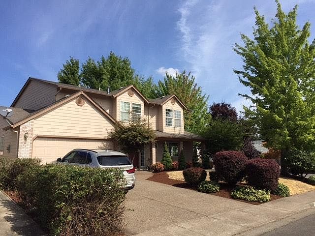 Front of house from left side