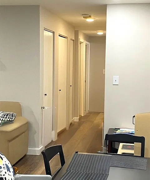 hallway with closets