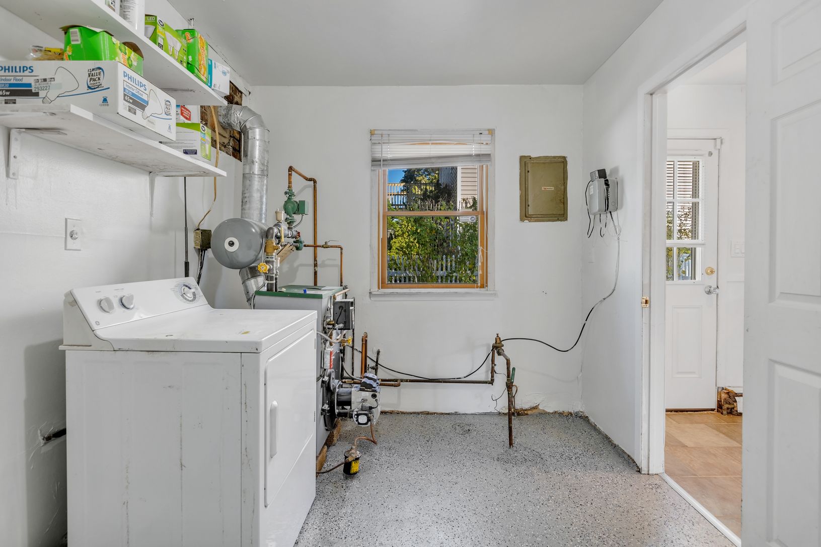  Utility Room/Washer Dryer hookup and Attic pull down stairs