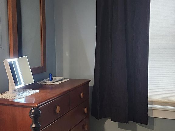 Bedroom view for bureau. Furniture not included