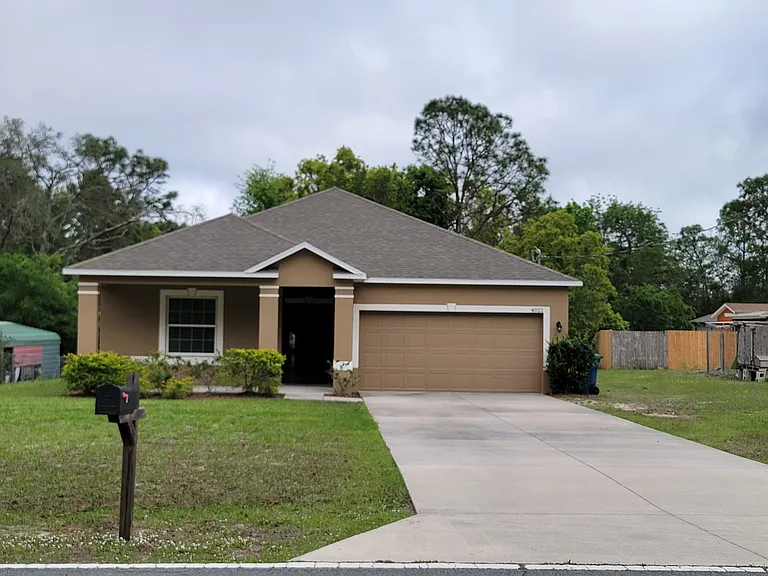 Front of home with covered porch