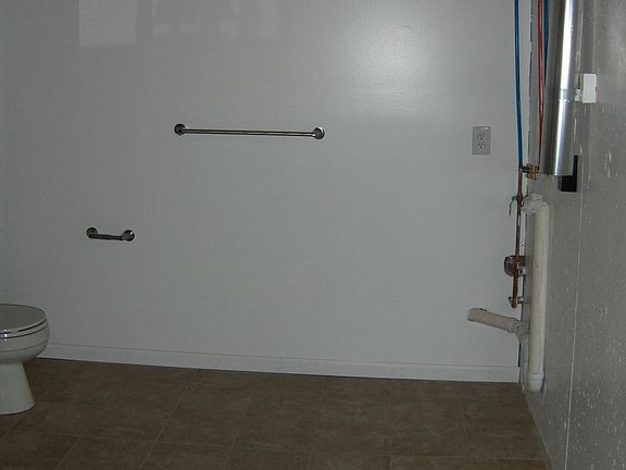 basement 1/2 bath with laundry hookups