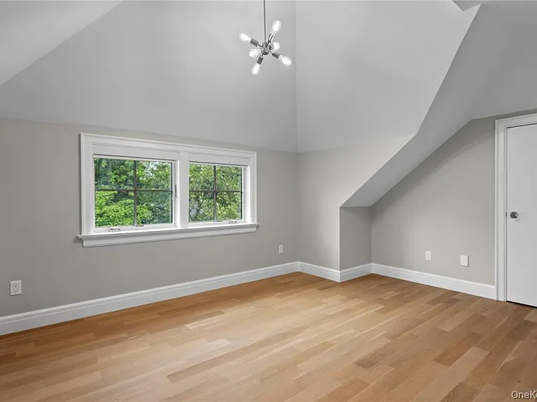 3rd floor lofted space great for additional living space, exercise room, office, etc.