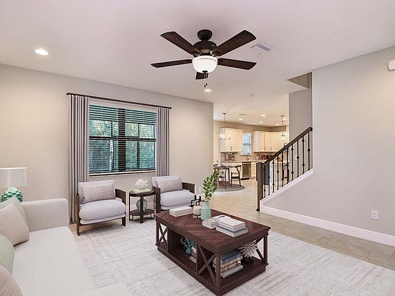 Jeppeson new construction home plan great room to kitchen by William Ryan Homes Tampa