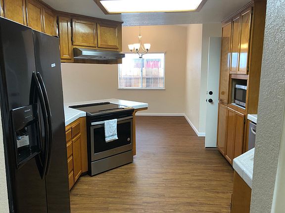 Updated Kitchen. New Refrigerator. New Microwave. Electric Stove.