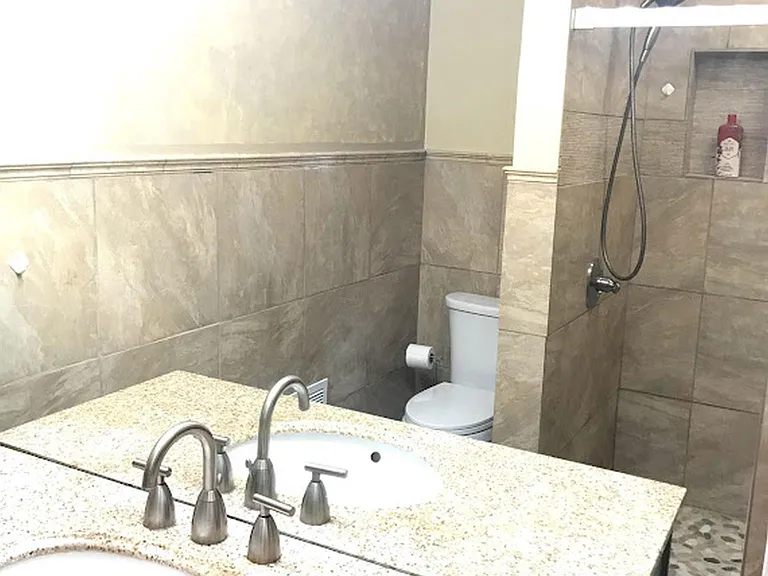 2nd floor shower, over half the wall is a mirror