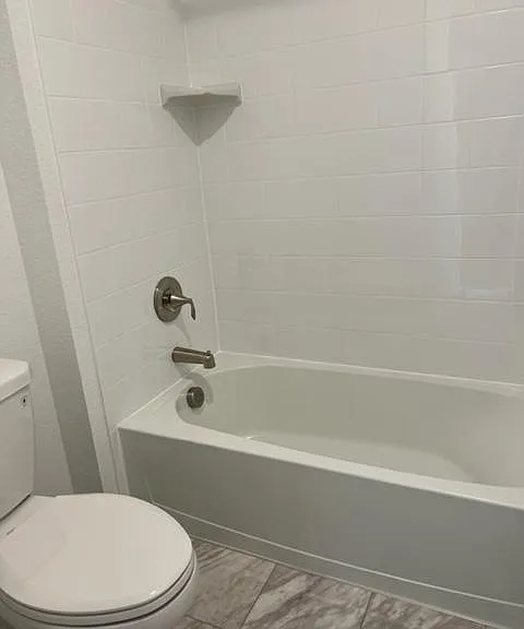Second bathroom -- tub and toilet