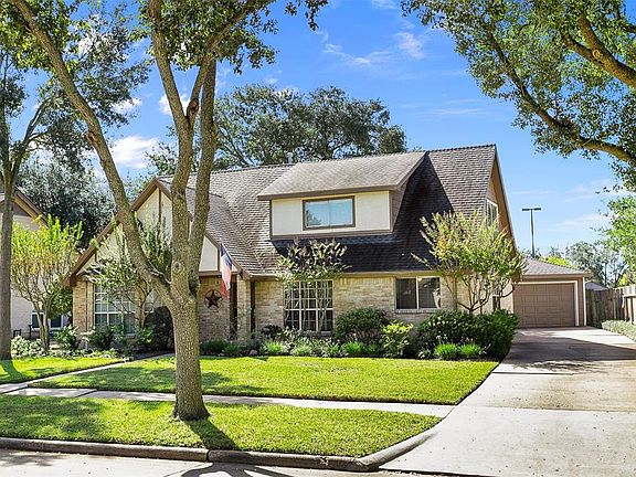 Located in Copperfield just walking distance to Labay, walking trails and Copperfield park. Nice landscaping, long driveway leads to detached garage with auto opener.
