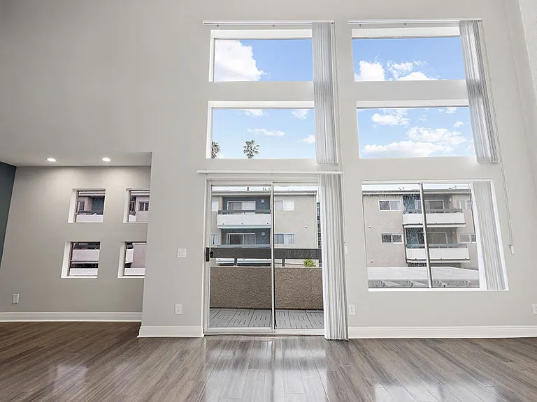 Floor to ceiling window view of Hughes Regency courtyard.