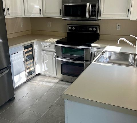 Kitchen with stainless steel appliances